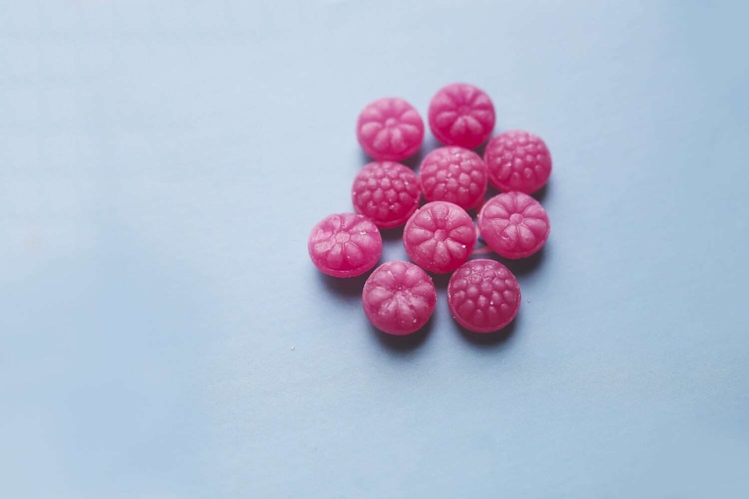 a group of pink candies