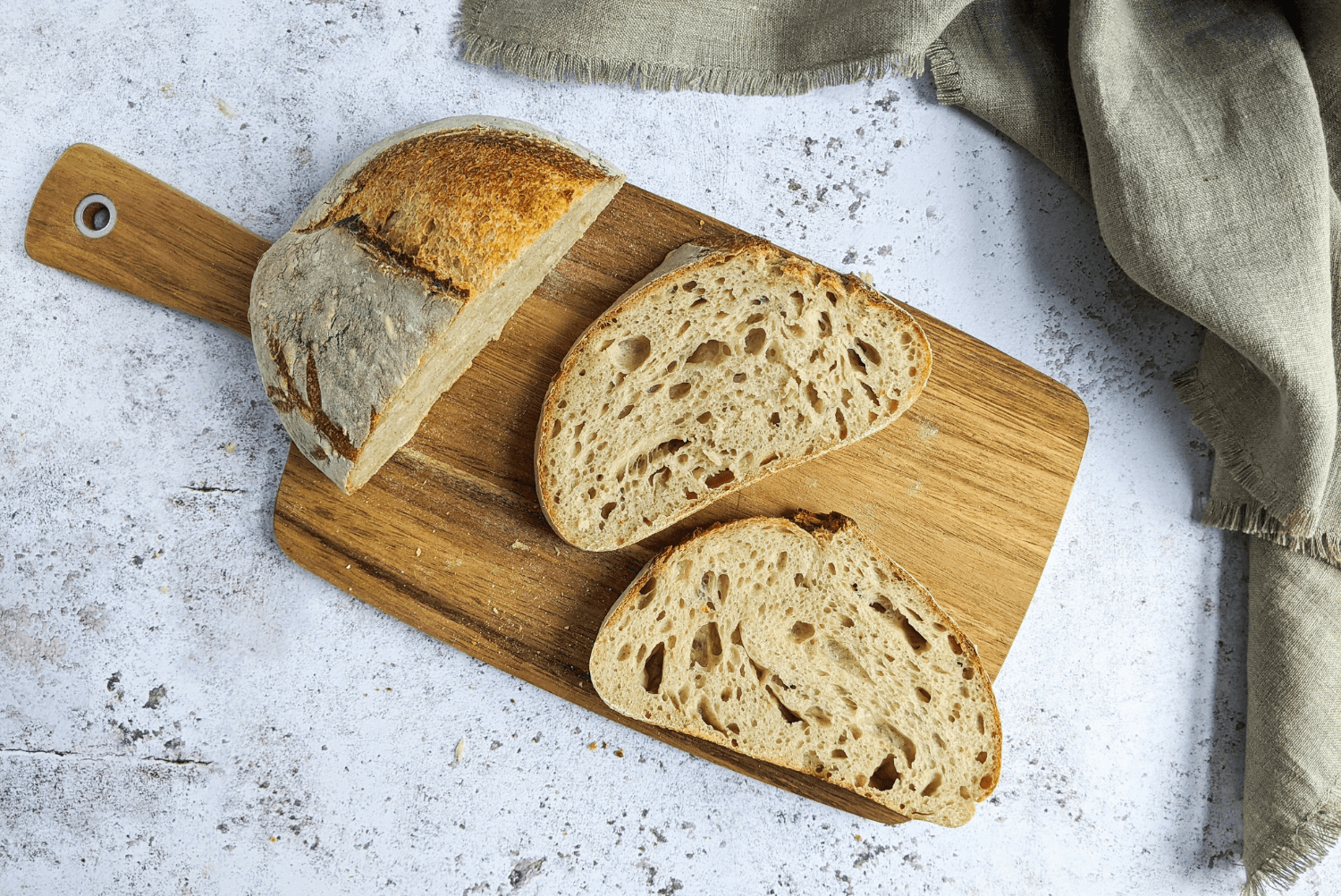 sliced sourdough bread on a cutting board
