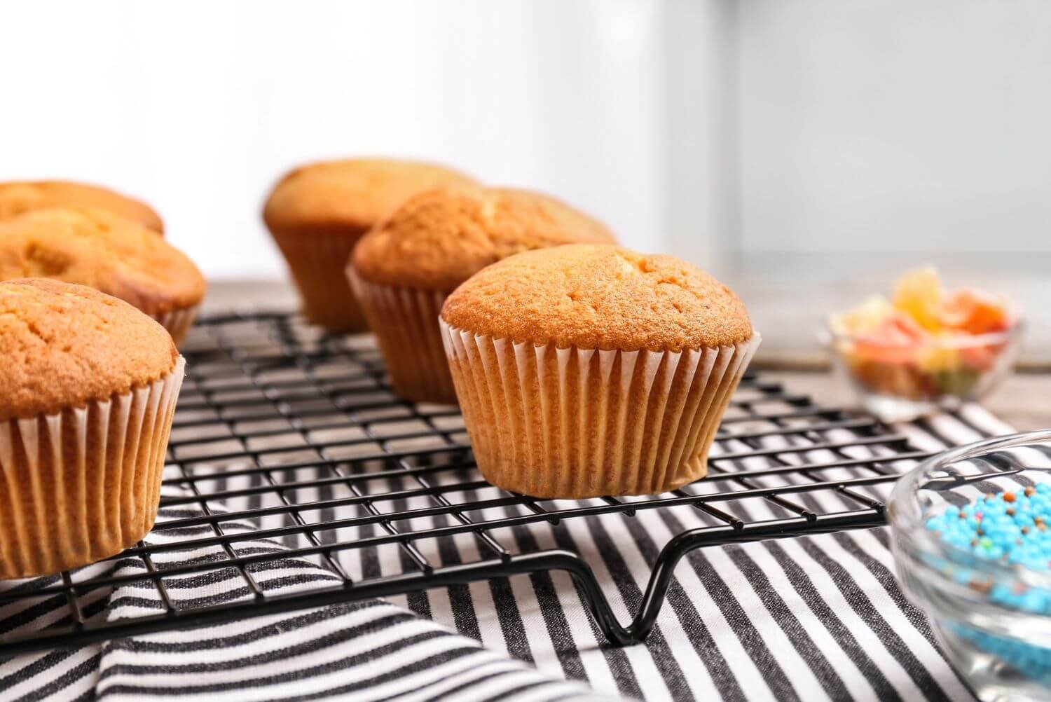 a group of muffins on a cooling rack